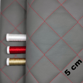 Simili cuir matelassé 5X5 cm, 540 g/m², largeur 145 cm, fraphite avec fil rouge Simili cuir matelassé 5X5 cm, 540 g/m², largeur 145 cm, fraphite avec fil rouge