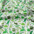 Tissu coton au métre imprimé Dinosaures couleur vert